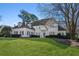 Impeccably landscaped lawn and charming two-story home at 115 N Devereux Nw Ct, Atlanta, GA 30327