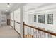 Bright hallway with high ceilings and hardwood floors at 115 N Devereux Nw Ct, Atlanta, GA 30327