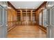 Spacious library with built-in shelves and hardwood floors at 115 N Devereux Nw Ct, Atlanta, GA 30327