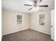 Well-lit bedroom with carpet and ceiling fan at 2681 Plantation Dr, Atlanta, GA 30344