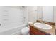 Clean bathroom with a single vanity, tub, and shower at 4660 Lake Hill Trl, Ellenwood, GA 30294