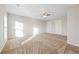 Bright bedroom with ceiling fan and neutral carpet at 4660 Lake Hill Trl, Ellenwood, GA 30294