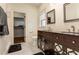 Elegant bathroom with double vanity, mosaic tile floor, and walk-in shower at 2972 Lookout Ne Pl, Atlanta, GA 30305