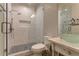 Modern bathroom with glass shower, tiled walls, and updated vanity at 2972 Lookout Ne Pl, Atlanta, GA 30305