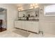 Bathroom with double vanity and marble flooring at 2972 Lookout Ne Pl, Atlanta, GA 30305