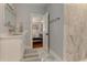 Modern bathroom with marble tile and a walk-in shower at 2972 Lookout Ne Pl, Atlanta, GA 30305