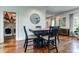 Small dining area with dark wood table and hardwood floors at 2972 Lookout Ne Pl, Atlanta, GA 30305