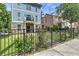 Landscaped front yard with a fence and walkway leading to the house entrance at 2972 Lookout Ne Pl, Atlanta, GA 30305