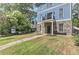 Landscaped front yard with a walkway to the front door of the house at 2972 Lookout Ne Pl, Atlanta, GA 30305