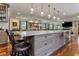 Large kitchen island with seating and a stainless steel sink at 2972 Lookout Ne Pl, Atlanta, GA 30305