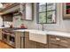 Spacious kitchen featuring high-end appliances and a farmhouse sink at 2972 Lookout Ne Pl, Atlanta, GA 30305