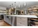 Large kitchen island with seating and a farmhouse sink at 2972 Lookout Ne Pl, Atlanta, GA 30305