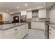 Modern kitchen with granite counters, stainless steel appliances, and an island at 2972 Lookout Ne Pl, Atlanta, GA 30305