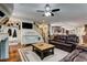 Open concept living room with hardwood floors and a view into the kitchen at 2972 Lookout Ne Pl, Atlanta, GA 30305