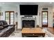 Living room features a fireplace, hardwood floors and French doors at 2972 Lookout Ne Pl, Atlanta, GA 30305