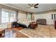 Main bedroom with hardwood floors, large windows, and a sitting area at 2972 Lookout Ne Pl, Atlanta, GA 30305