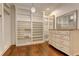 Spacious Primary closet with ample built-in shelving and drawers at 2972 Lookout Ne Pl, Atlanta, GA 30305