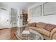 Upstairs sitting room with hardwood floors, built in shelving and window seat at 2972 Lookout Ne Pl, Atlanta, GA 30305