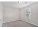 Well-lit bedroom with neutral walls and carpeted floor at 3530 Kingsbrooke Ct, Decatur, GA 30034