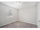 Bright bedroom with neutral walls and carpeted floor at 3530 Kingsbrooke Ct, Decatur, GA 30034