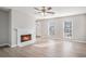 Bright living room with fireplace and laminate flooring at 3530 Kingsbrooke Ct, Decatur, GA 30034