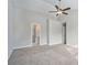 Spacious main bedroom with carpet and private bathroom access at 3530 Kingsbrooke Ct, Decatur, GA 30034