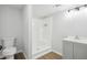 Basement bathroom with shower and gray vanity at 5879 Wellborn Trl, Lithonia, GA 30058