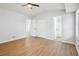 Large bedroom with wood-look floors, and access to a bathroom at 5879 Wellborn Trl, Lithonia, GA 30058