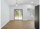 Bright dining area with sliding glass doors leading to a patio at 5879 Wellborn Trl, Lithonia, GA 30058