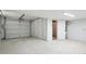 Attached garage with extra storage space at 5879 Wellborn Trl, Lithonia, GA 30058