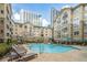 Resort-style pool with plenty of lounge chairs for relaxing at 800 Peachtree Ne St # 8429, Atlanta, GA 30308