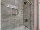 Bathroom with grey tile and shower/tub combo at 912 Northridge Nw Dr, Conyers, GA 30012