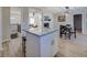 Kitchen island with granite countertop and white cabinets at 912 Northridge Nw Dr, Conyers, GA 30012