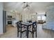 Open concept kitchen and dining area with stainless steel appliances and granite countertops at 912 Northridge Nw Dr, Conyers, GA 30012