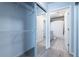 Hallway with mirrored closets and two bathrooms at 860 Peachtree Ne St # 2104, Atlanta, GA 30308