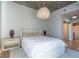 Spacious bedroom with light walls and large windows at 860 Peachtree Ne St # 2104, Atlanta, GA 30308