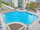 Inviting rooftop pool with plenty of lounge chairs at 860 Peachtree Ne St # 2104, Atlanta, GA 30308