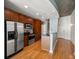 Modern kitchen with stainless steel appliances and wood cabinets at 943 Peachtree Ne St # 1109, Atlanta, GA 30309