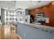 Modern kitchen features granite countertops and wood cabinets at 943 Peachtree Ne St # 1109, Atlanta, GA 30309