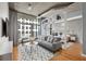 Open concept living room with hardwood floors and room divider at 943 Peachtree Ne St # 1109, Atlanta, GA 30309
