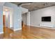 Hardwood floors and exposed ductwork in living room at 943 Peachtree Ne St # 1109, Atlanta, GA 30309