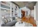 Open concept living area with modern furnishings and a kitchen at 943 Peachtree Ne St # 1109, Atlanta, GA 30309