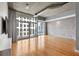 Hardwood floors and floor to ceiling windows in living room at 943 Peachtree Ne St # 1109, Atlanta, GA 30309