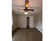 Bedroom with wood floors and ceiling fan at 116 E Wade St, Oxford, GA 30054