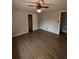 Large bedroom with wood floors and closet at 116 E Wade St, Oxford, GA 30054