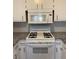 White appliances and granite countertops at 116 E Wade St, Oxford, GA 30054