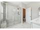 Large bathroom with a walk-in shower and marble tile at 505 Stagecoach Bnd, Smyrna, GA 30080