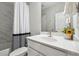 Clean bathroom with a white vanity and marble tile at 505 Stagecoach Bnd, Smyrna, GA 30080