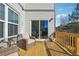 Relaxing deck with wooden railings and wicker furniture at 505 Stagecoach Bnd, Smyrna, GA 30080