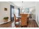 Casual dining area features round table, four chairs, and hardwood floors at 505 Stagecoach Bnd, Smyrna, GA 30080